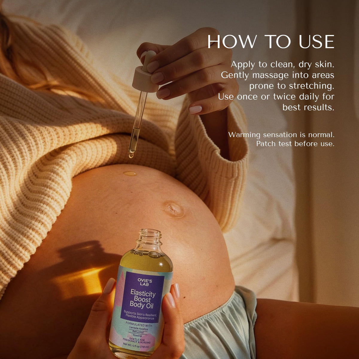 Ovie's Lab being massaged onto a pregnant belly for daily hydration and comfort