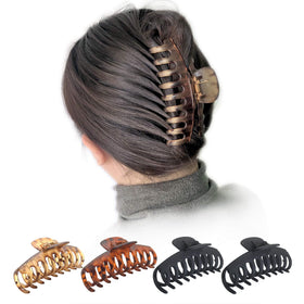 OWIIZI clip in a high bun demonstrating secure hold for long, thick hair