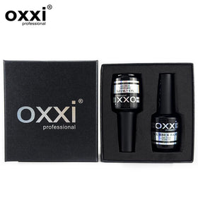 OXXI Professional rubber base brush applying elastic base gel demonstrating smooth coverage and flexibility