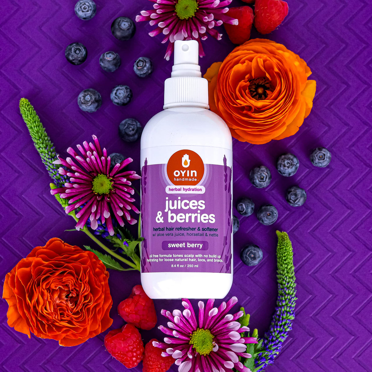 Oyin Handmade applied on curly hair to refresh and define coils