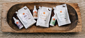 Oyin Handmade misting spray action demonstrating fine hydration delivery