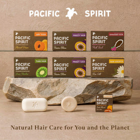 Pacific Spirit bar next to phone to show compact size and portability