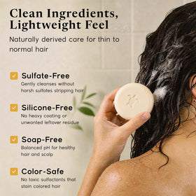 Pacific Spirit bar being applied to wet hair in shower demonstrating quick detangling benefit