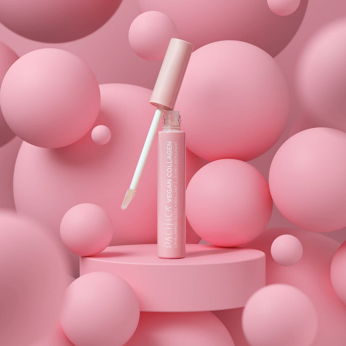 Pacifica gloss on model lips demonstrating subtle plump and luminous, natural-looking volume
