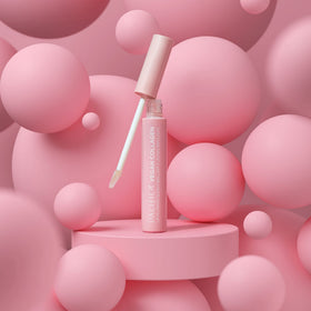 Pacifica gloss on model lips demonstrating subtle plump and luminous, natural-looking volume