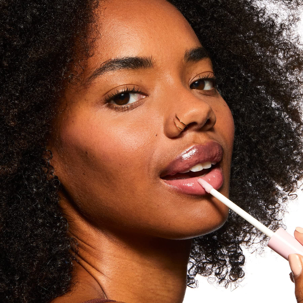 Pacifica gloss texture close-up highlighting creamy non-sticky formula and hydration