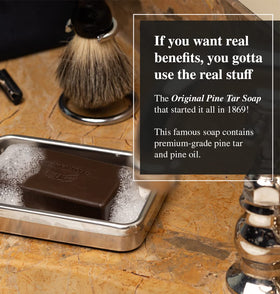 Close up of Packer's Pine soap texture highlighting natural pine tar and conditioning lather