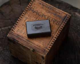 Packer's Pine lather on skin demonstrating creamy foam and cleansing
