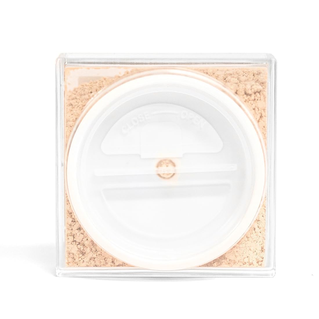 Palladio powder being picked up by a fluffy brush for effortless application