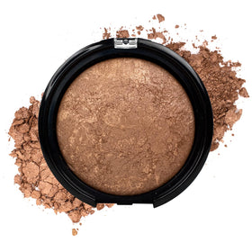 Palladio bronzer swatch on arm illustrating rich pigment and gradual buildability