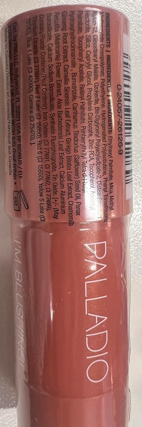 Palladio model wearing peach tint in daylight showing dewy natural finish