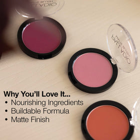Palladio blush next to coin for scale showing compact size and travel convenience