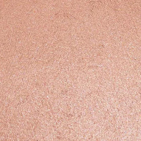 Close-up of Palladio baked bronzer texture revealing fine shimmer and blendable pigment