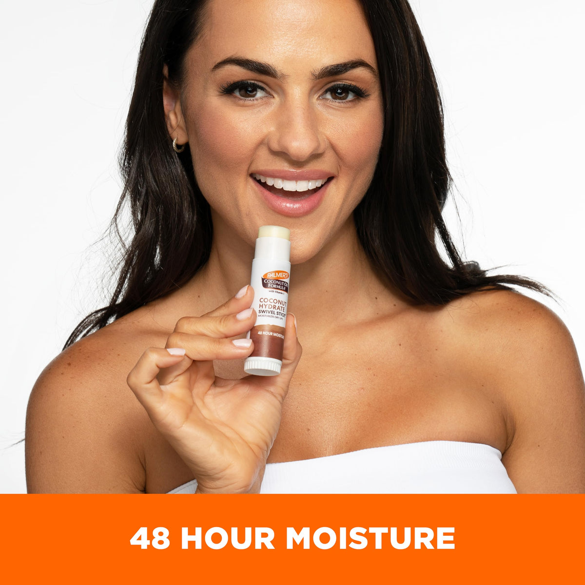 Palmer's applying stick to lips for instant soothing and moisturization