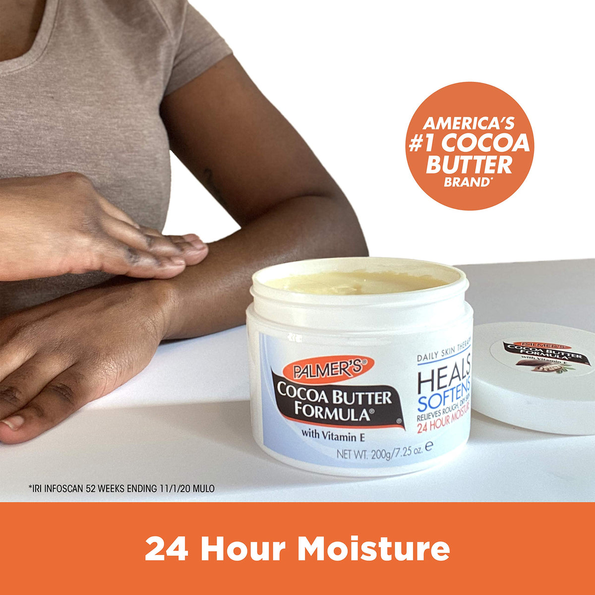 Palmer's balm being applied to a hand for quick moisturizing benefit