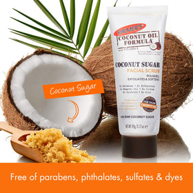 Hand applying Palmer's scrub to damp skin demonstrating easy massage and rinse-off benefit