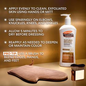 Rubbing Palmer's lotion into elbow to demonstrate even moisturizing finish