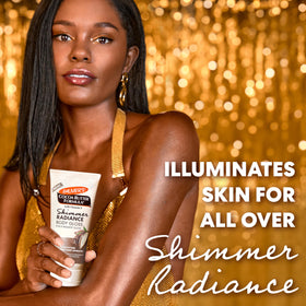Palmer's close-up of lotion texture and shimmer pearls showing smooth hydration