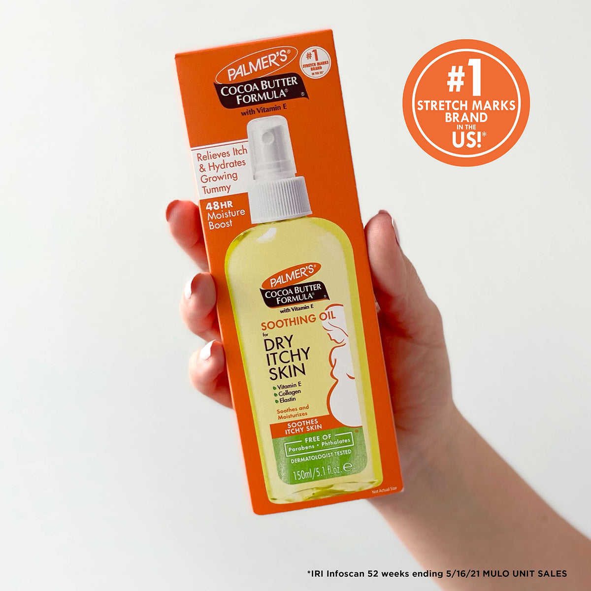 Palmer's 5.1 oz bottle in hand showing portable size and travel convenience