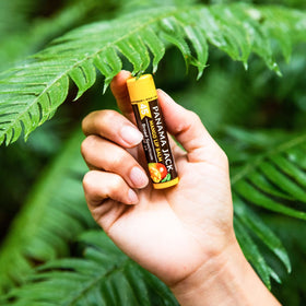 Panama Jack tropical balm on a beach scene providing sun protection outdoors