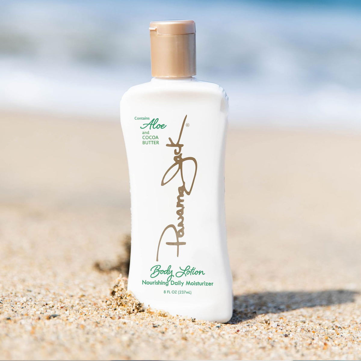 Panama Jack lotion texture swirled on surface showing lightweight absorbent lotion feel