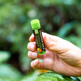 Panama Jack tube held in hand for scale and portable convenience