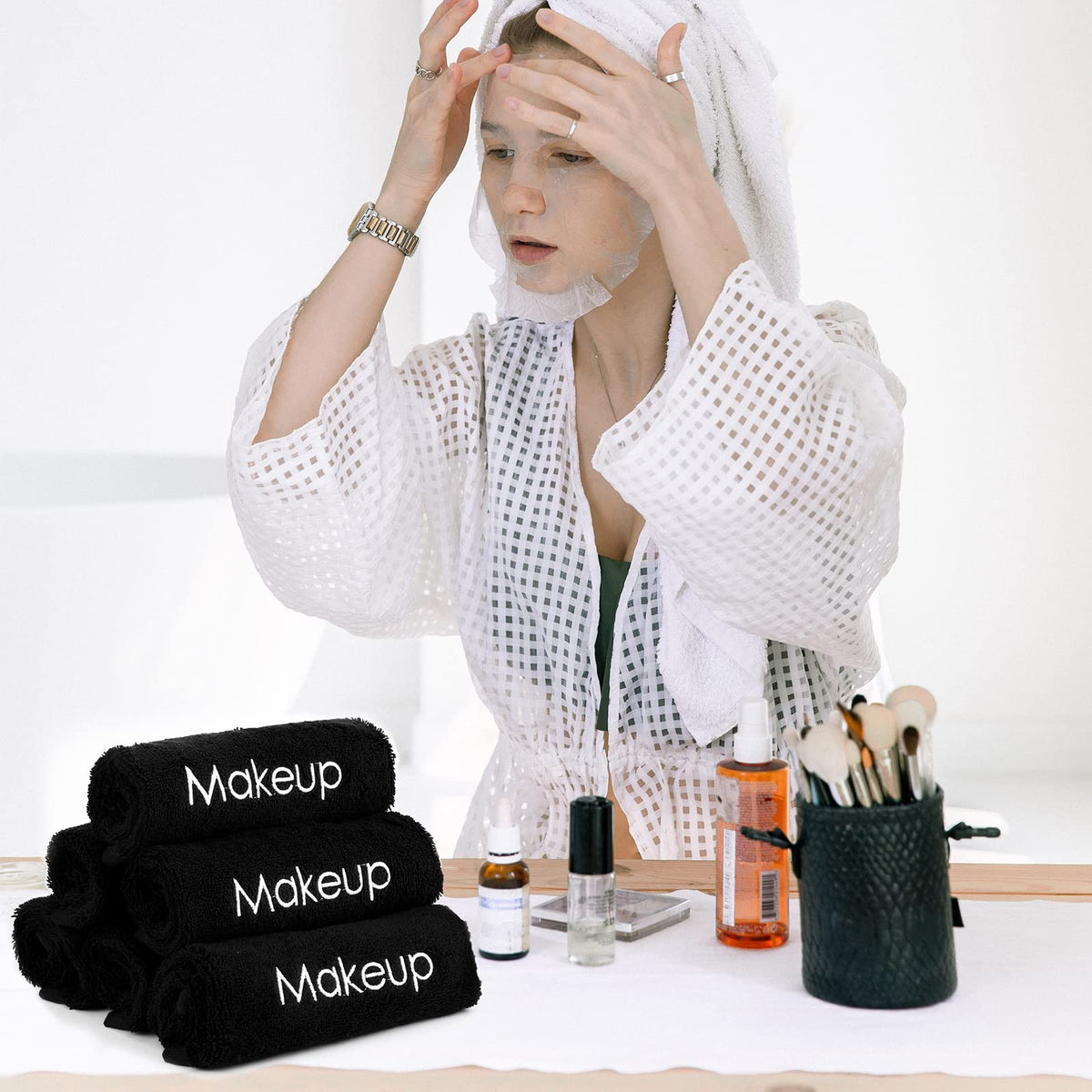 Panelee in use removing foundation from face for effective, gentle makeup removal