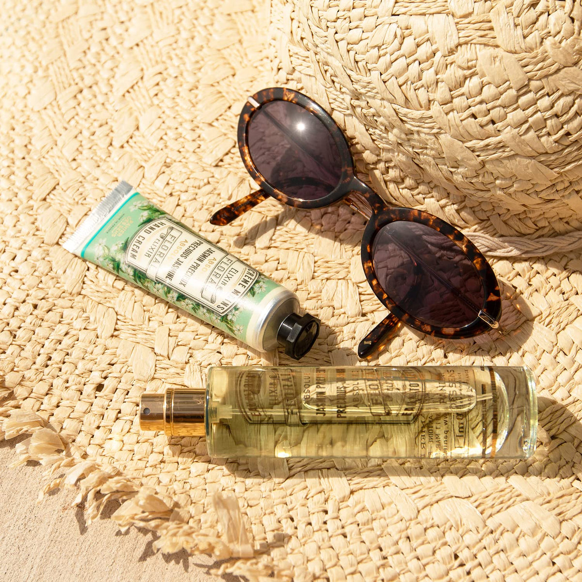 Panier des Sens tube inside a handbag lifestyle shot showing convenient everyday carry