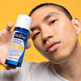 PanOxyl on a bathroom shelf in routine setting suggesting daily use and skincare integration