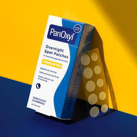 PanOxyl box on bathroom counter suggesting overnight acne care