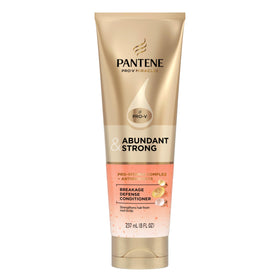 Person with fuller-looking hair after Pantene conditioner routine