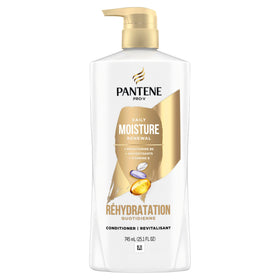 Pantene conditioner applied to curly hair demonstrating softer definition