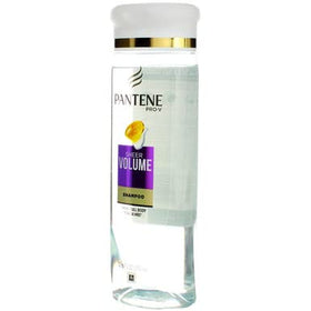 Pouring Pantene shampoo into palm to show consistency and easy dosing