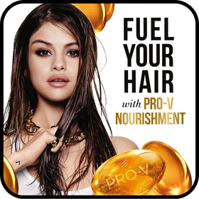 Pantene 12.6 ounce bottle next to common items showing size and portability