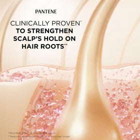 Pantene bottles in hand showing sizes for travel and everyday use