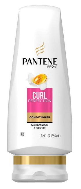 Pantene bottle beside hand showing 12 fl oz scale