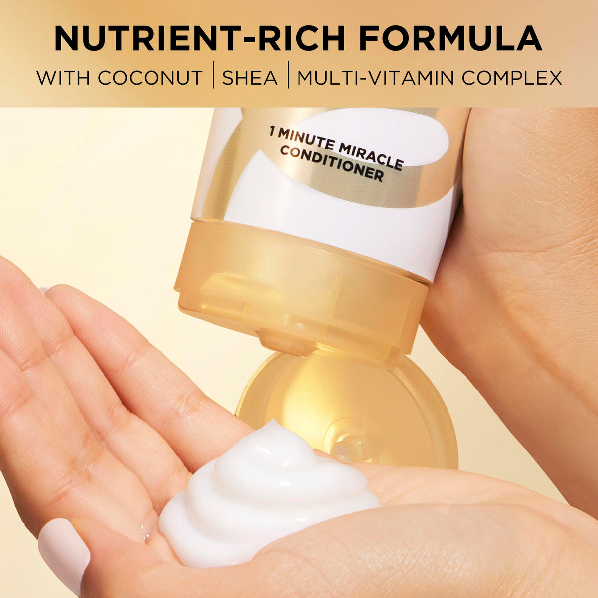 Pantene bottle in hand showing 10.9 fl oz size for scale