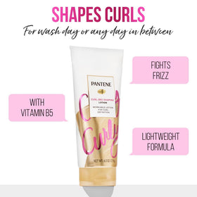 Pantene bottle next to a hand to show size and travel-friendly benefit