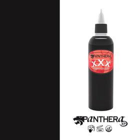 Panthera ink in use during tattoo session showing bold black filling benefit
