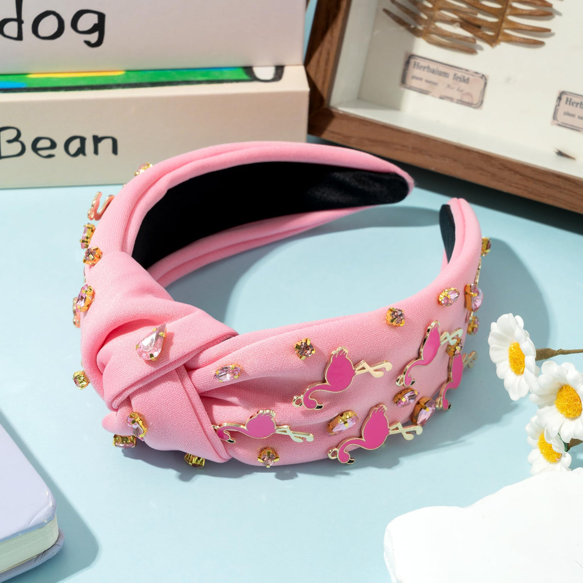 PANTIDE flamingo headband worn at beach demonstrates secure non-slip hold