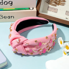 PANTIDE flamingo headband worn at beach demonstrates secure non-slip hold