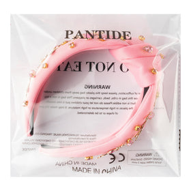 PANTIDE flamingo headband styled at party showing festive tropical accessory appeal