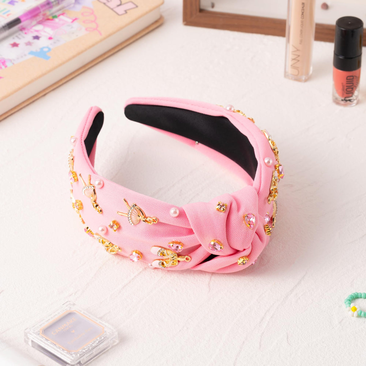 PANTIDE headband worn by dancer with costume showing performance-ready style