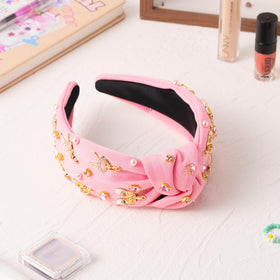 PANTIDE headband worn by dancer with costume showing performance-ready style