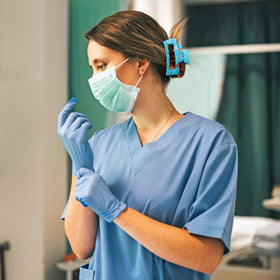 PANTIDE lifestyle image on a nurse in scrubs showing practical daily use