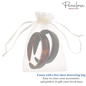 Parcelona headband held in hand showing true scale and lightweight feel