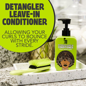Pardon My Fro being applied to damp curls to reduce tangles and frizz
