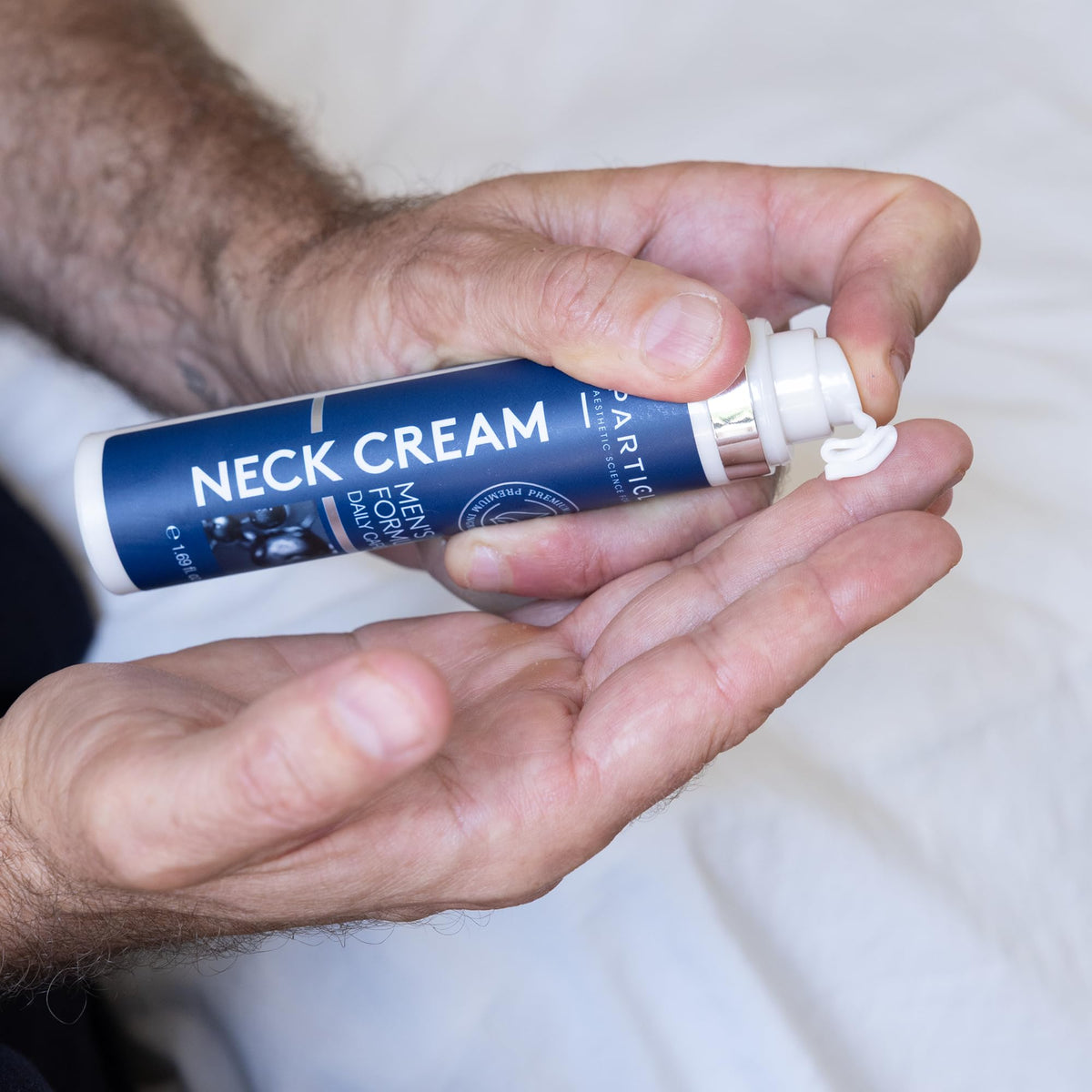 Particle neck cream label detail displaying ingredient list and brand