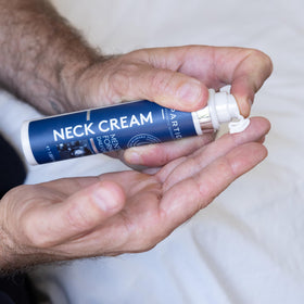 Particle neck cream label detail displaying ingredient list and brand