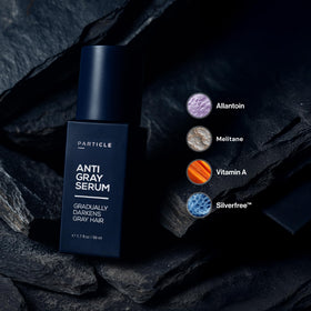 Particle serum texture on fingertip, demonstrates lightweight absorbent formula